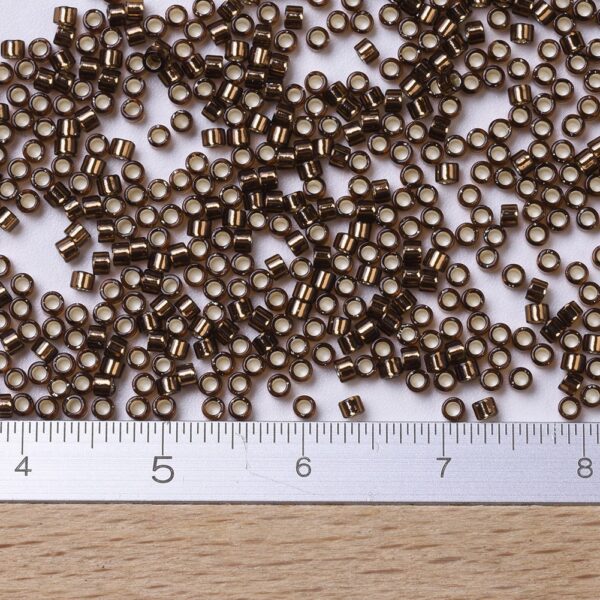 1b8c397713d74f2475a51d9e7b3fb210 MIYUKI DB0150 Delica Beads 11/0 - Transparent Silver Lined Root Beer, 100g/bag