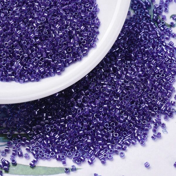 e68a09f9c81dcd3ff16fb61d84f941c9 MIYUKI DB0284 Delica Beads 11/0 - Transparent Sparkling Purple Lined Aqua Luster, 100g/bag